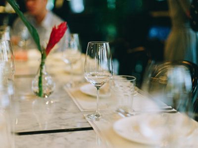 selective-focus photography of wine glass on table